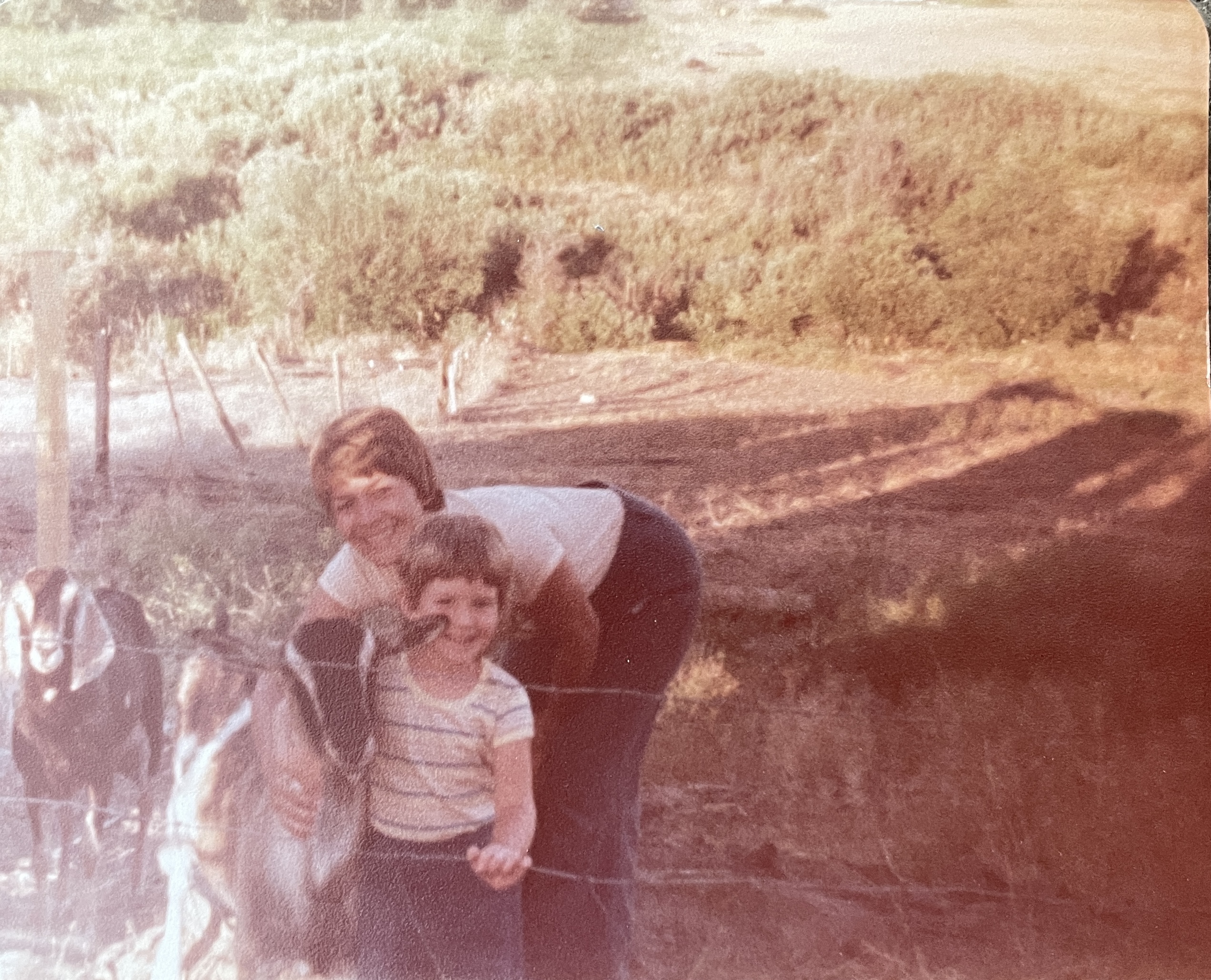 me hug goat me and a sugar baby personal watermelon I grew